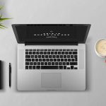 Laptop, coffee, arm — London Tantric Experts: Elevate Your Wellbeing Today